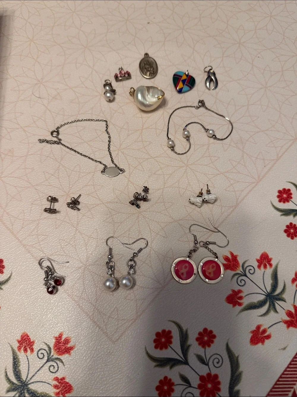 Jewelry lot 6/set earrings 2 bracelets and six charms